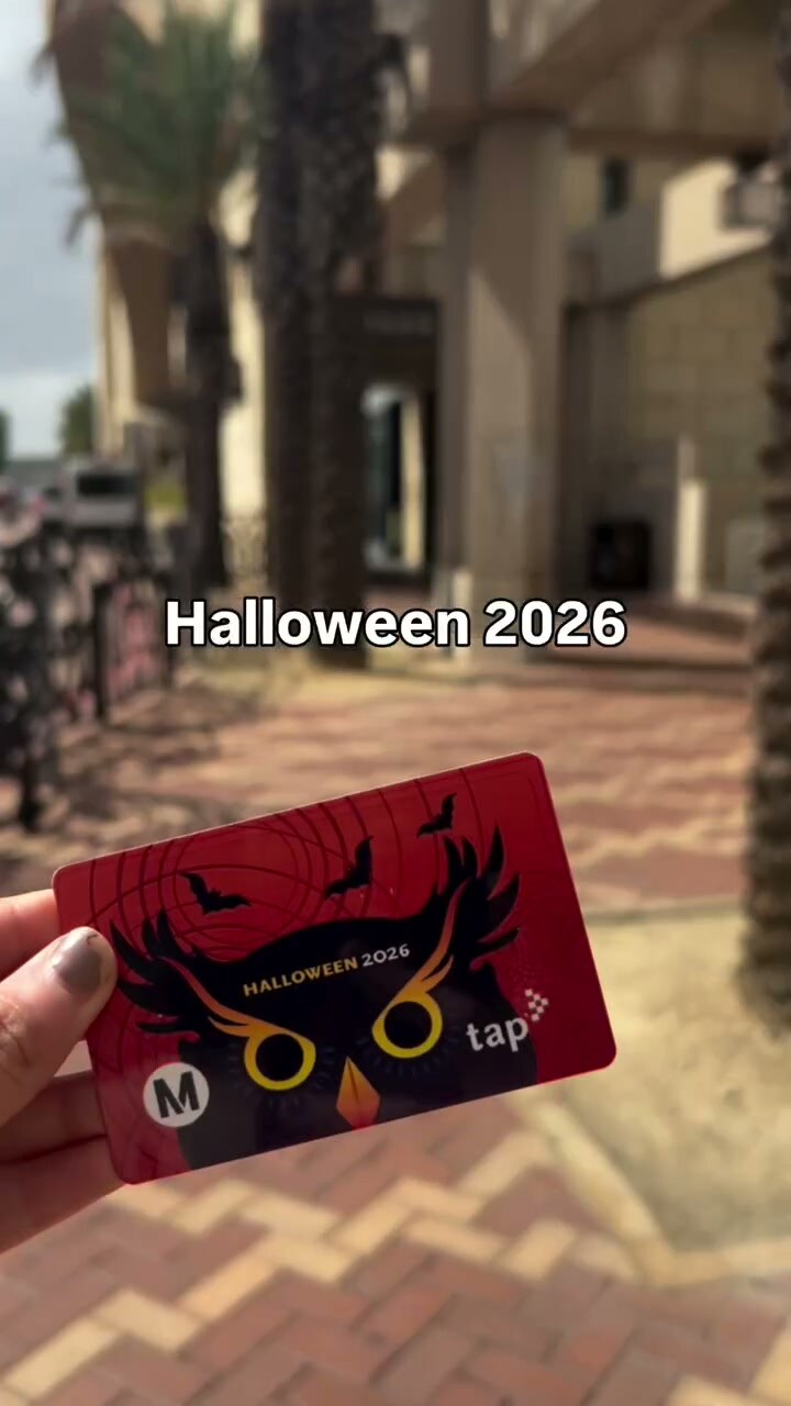 The red 2026 Halloween commemorative TAP card with an owl design outside Los Angeles Union Station.