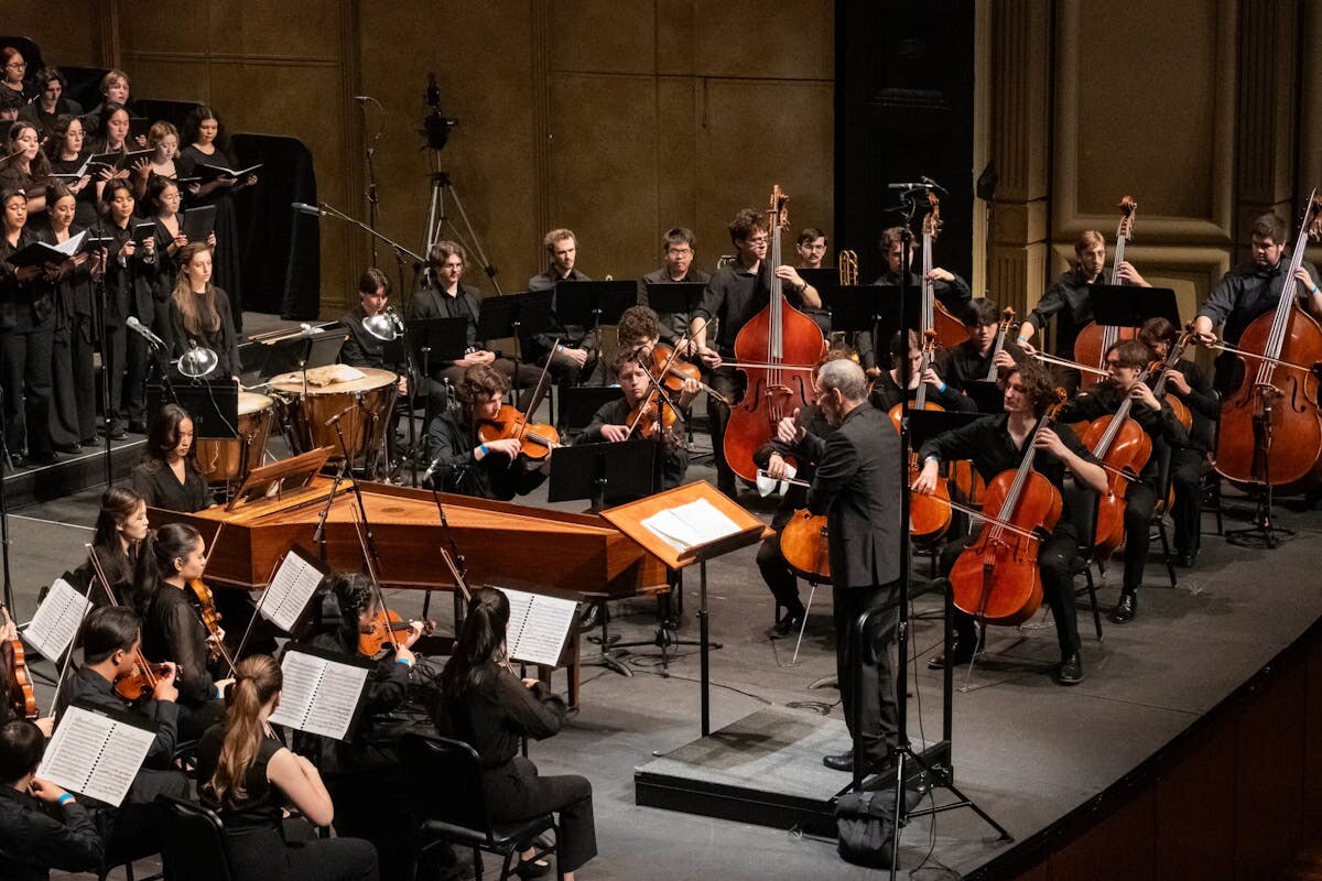 Orchestra and choir performers together on stage
