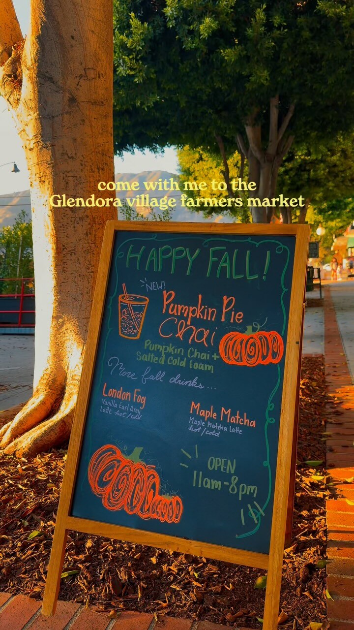 Outdoor Glendora Village Farmers Market scene with market stalls along the street.